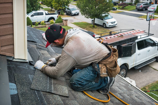 Professional Roof Replacement technician working in Marlborough, MO